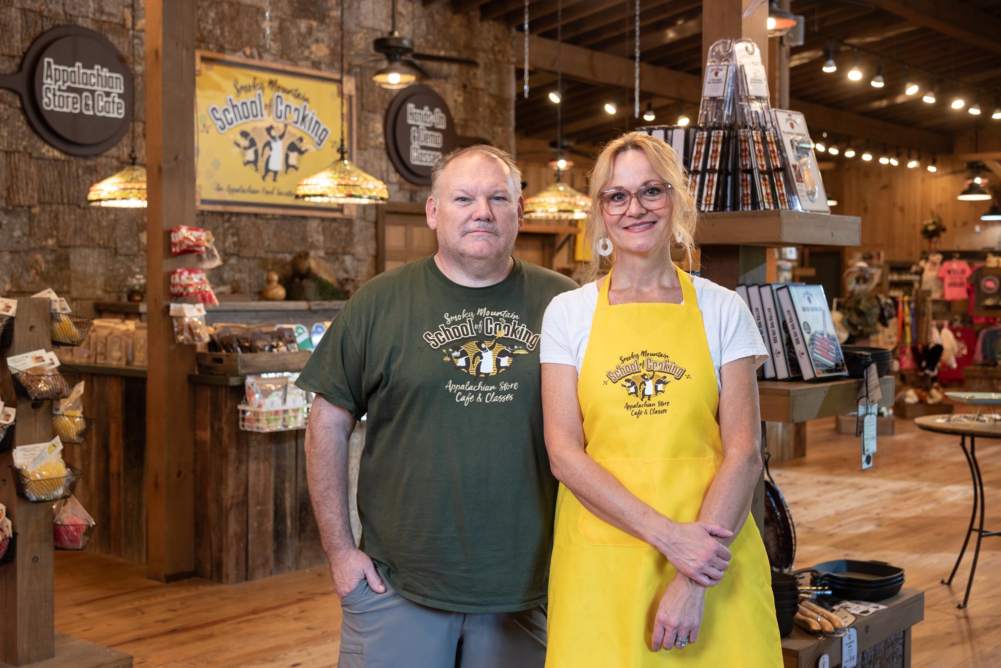 Man and woman posing inside gift store