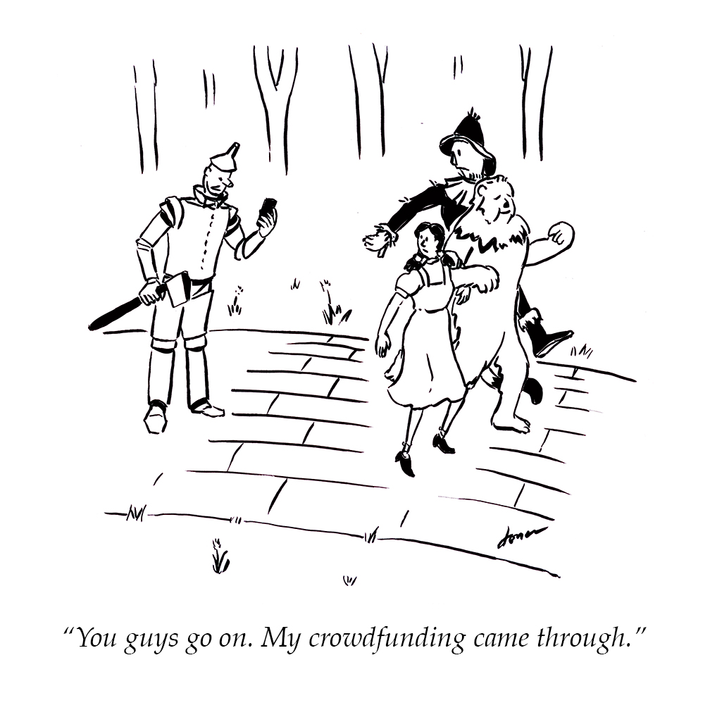 Cartoon: Wizard of Oz characters on the yellow brick road with the Tin Man stopped, looking at his smart phone and saying "You guys go on. My crowdfunding came through."