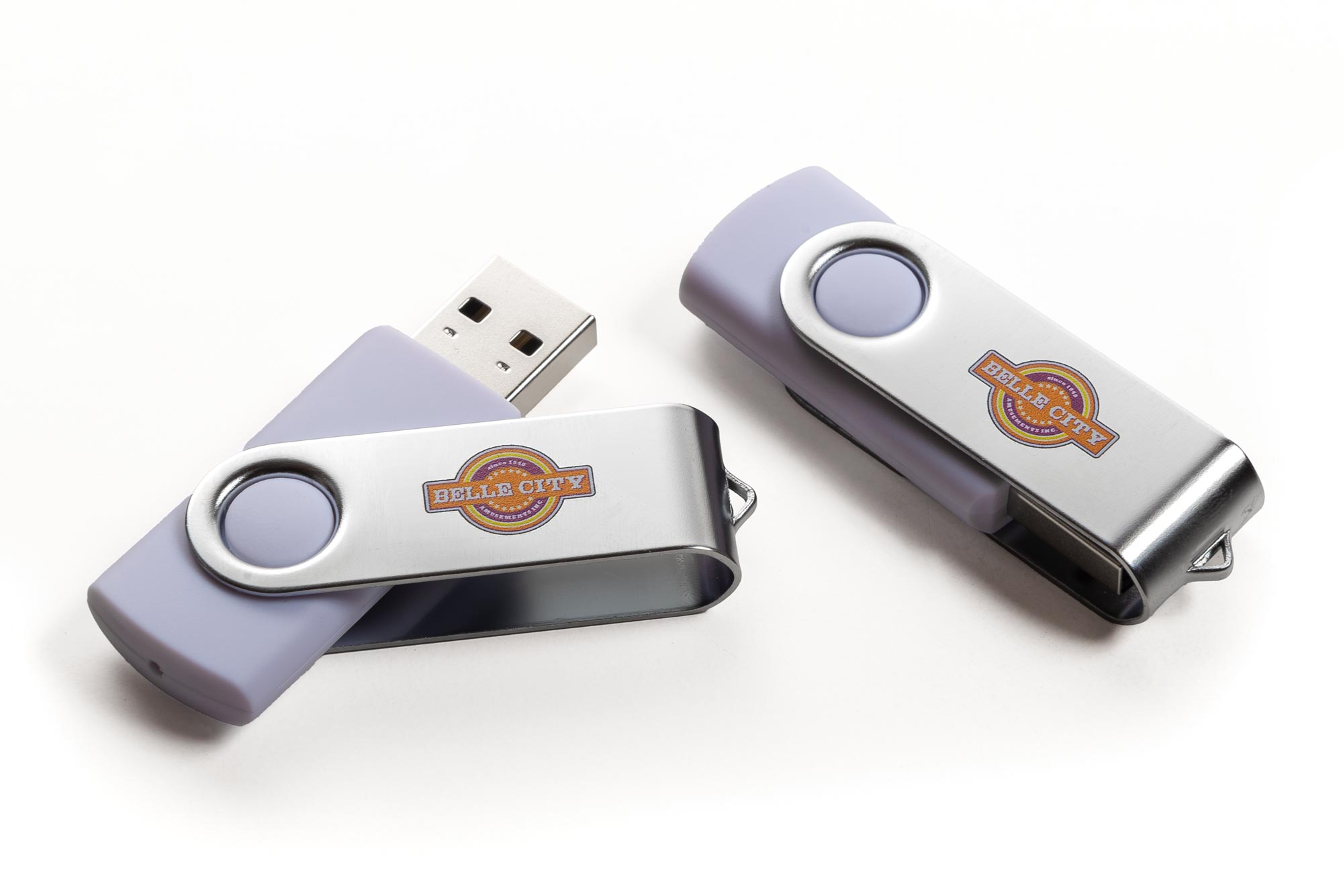 USD thumb drives with Belle City logo on shields.