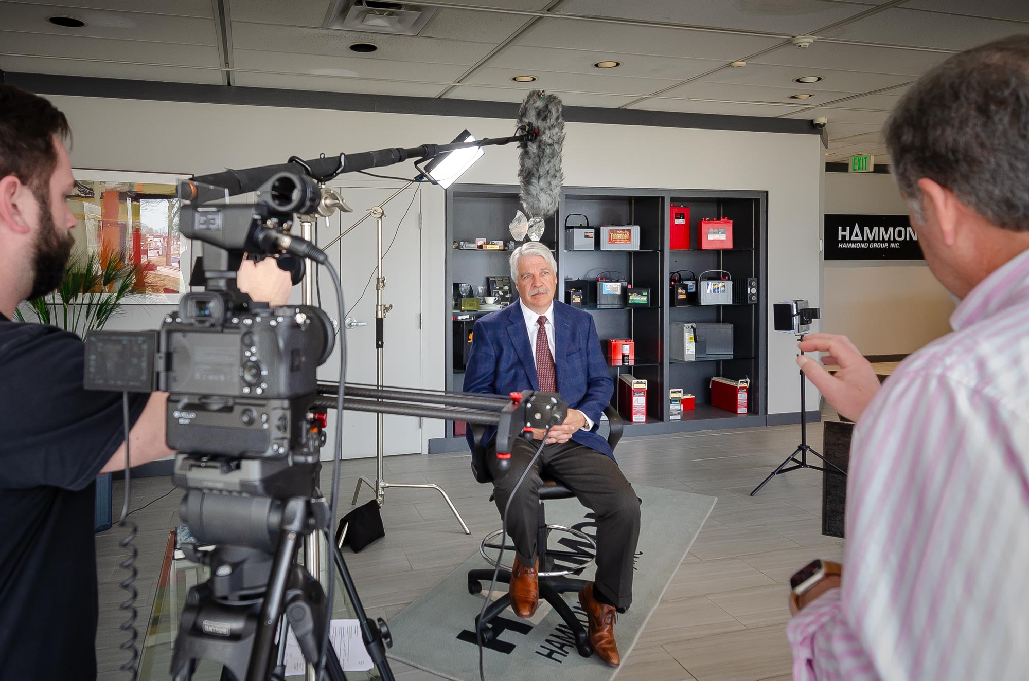 Man being interviewed by camera crew.