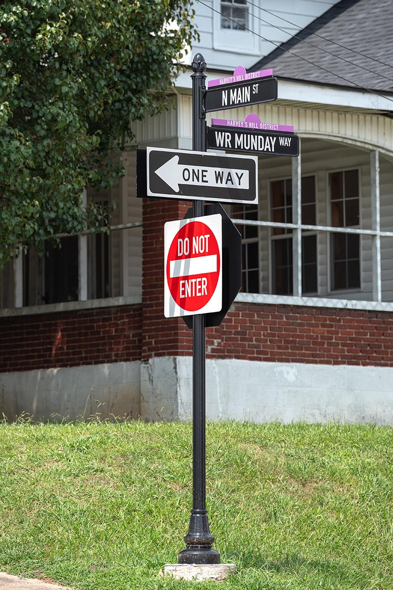 Street corner with three unified signs