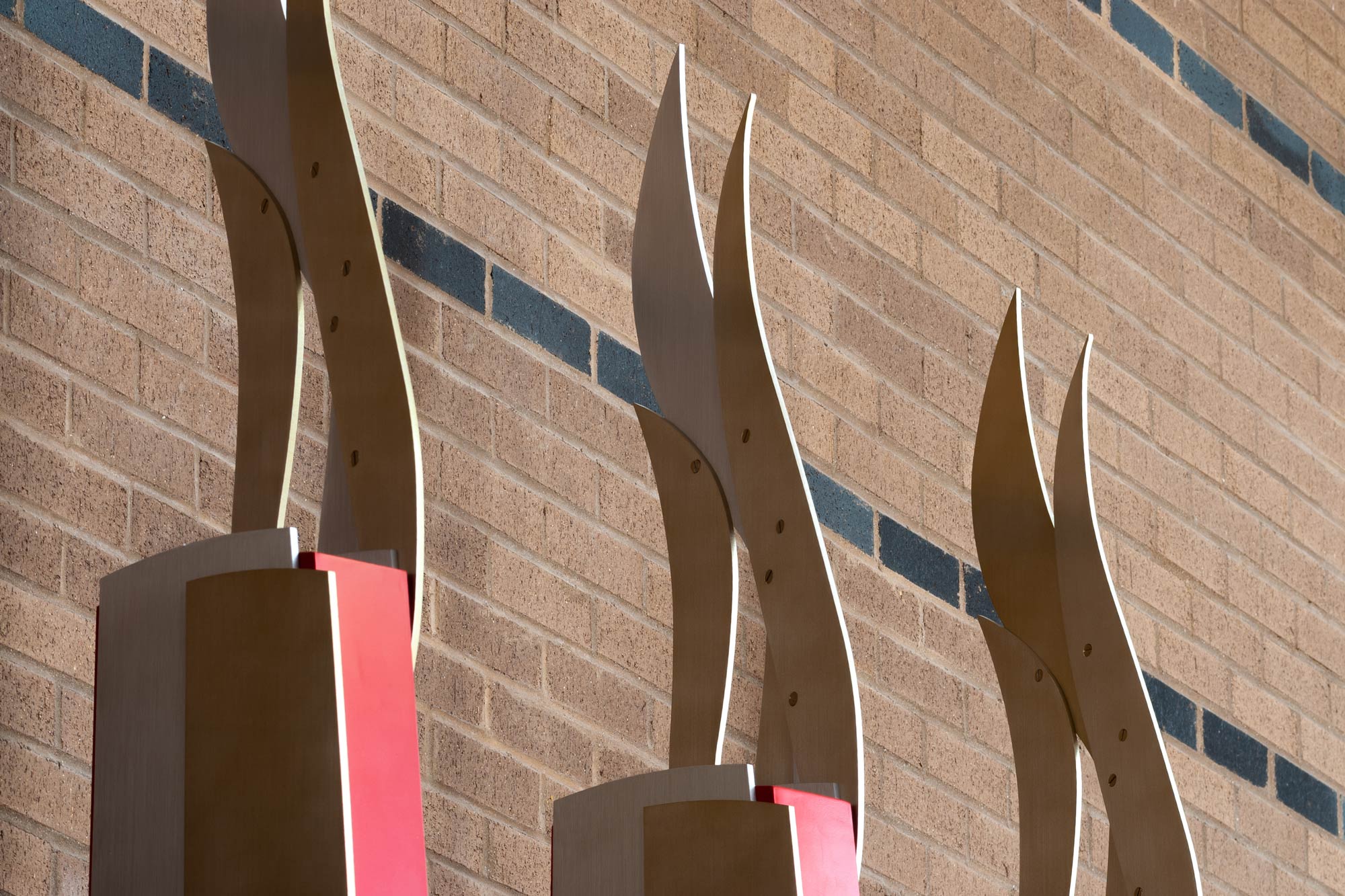 backside view of flame metal shapes