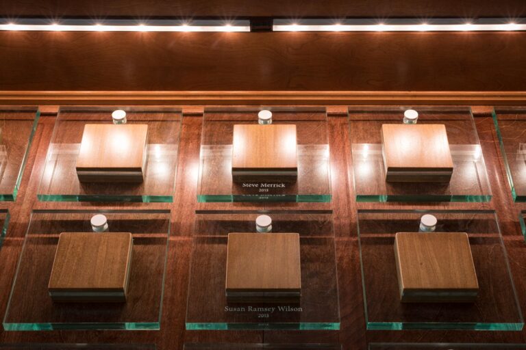 Details of glass and wood blocks on donor wall