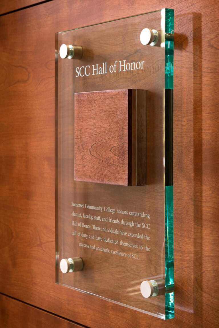 SCC Hall of Honor dedication panel, glass with wood