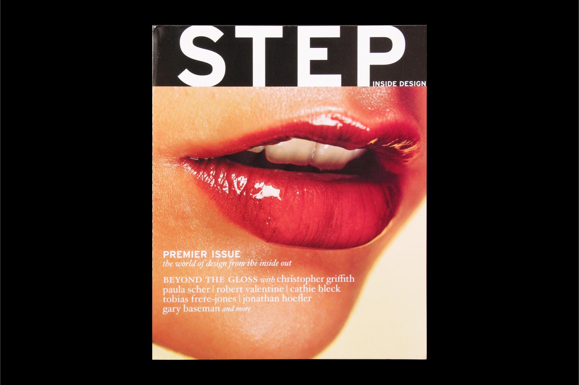 Magazine cover the close image of a woman's lips and large text "Step" Inside Design