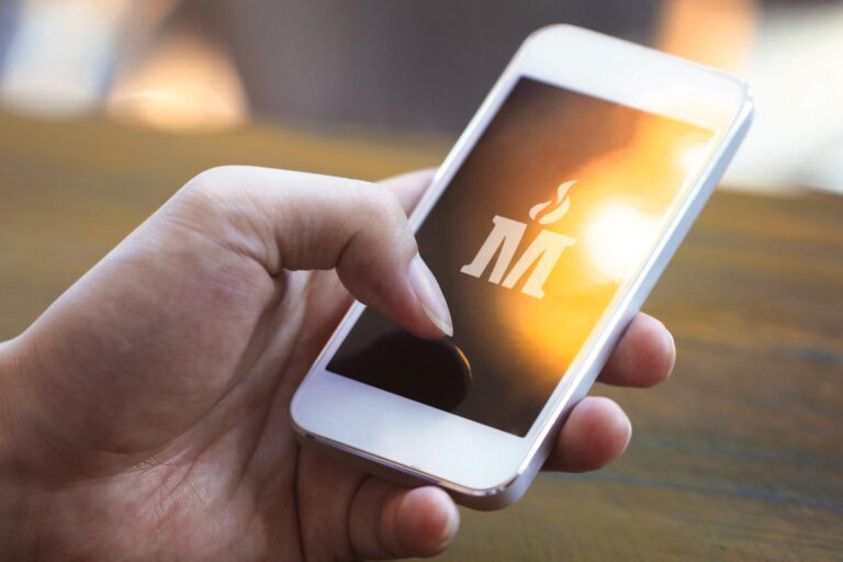 smartphone with Madison County Schools logo