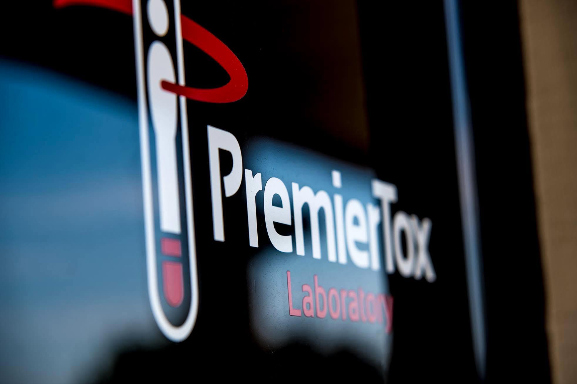 Logo on a glass door at PremierTox Laboratory