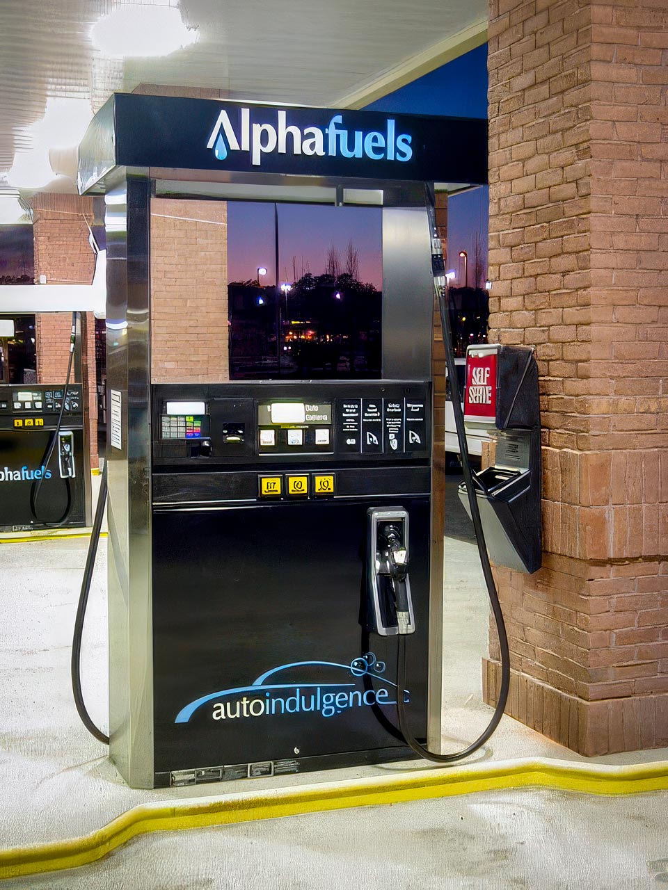 Branded gas pump with Alphafuels and Autoindulgence logos