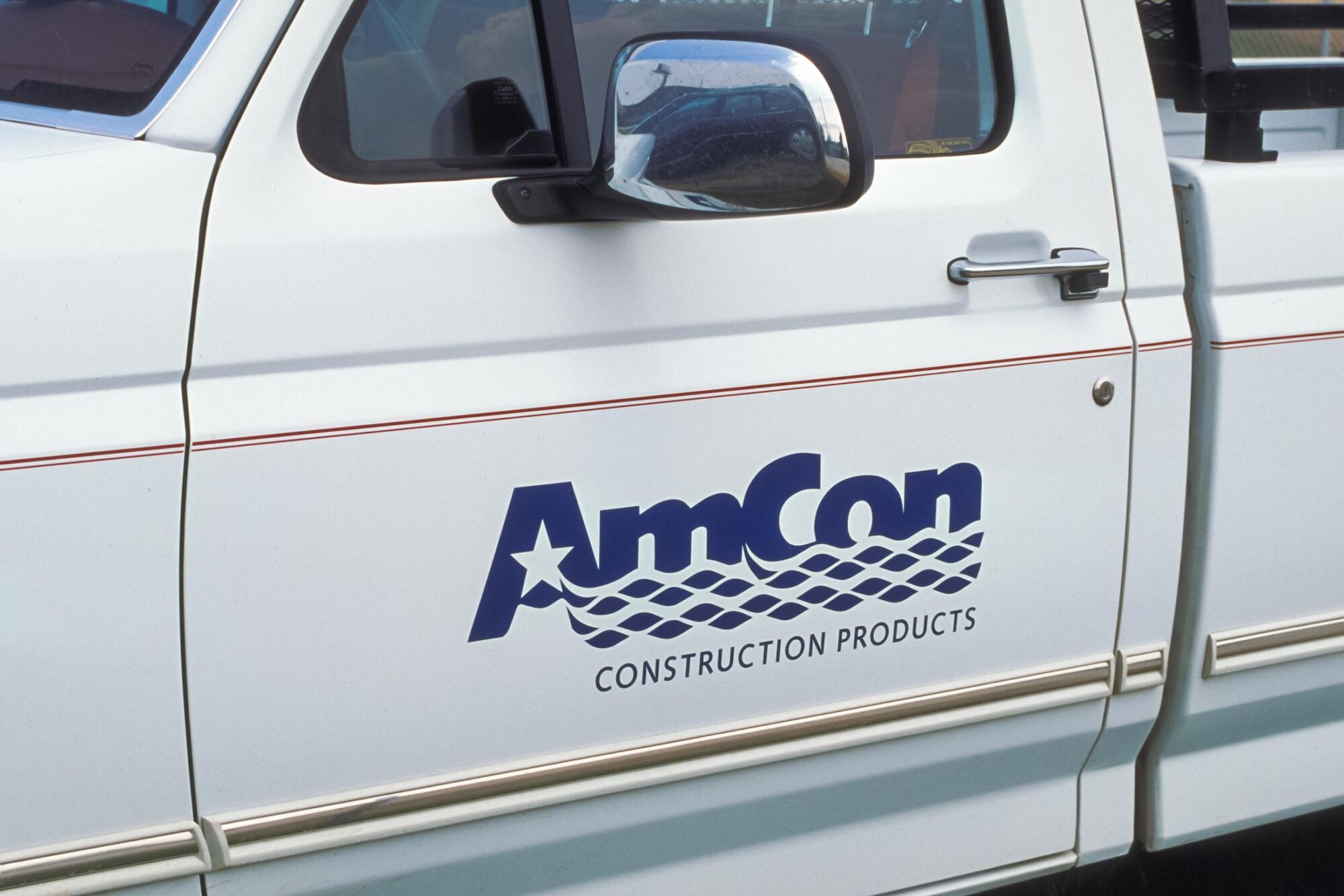 Truck door with AmCon logo