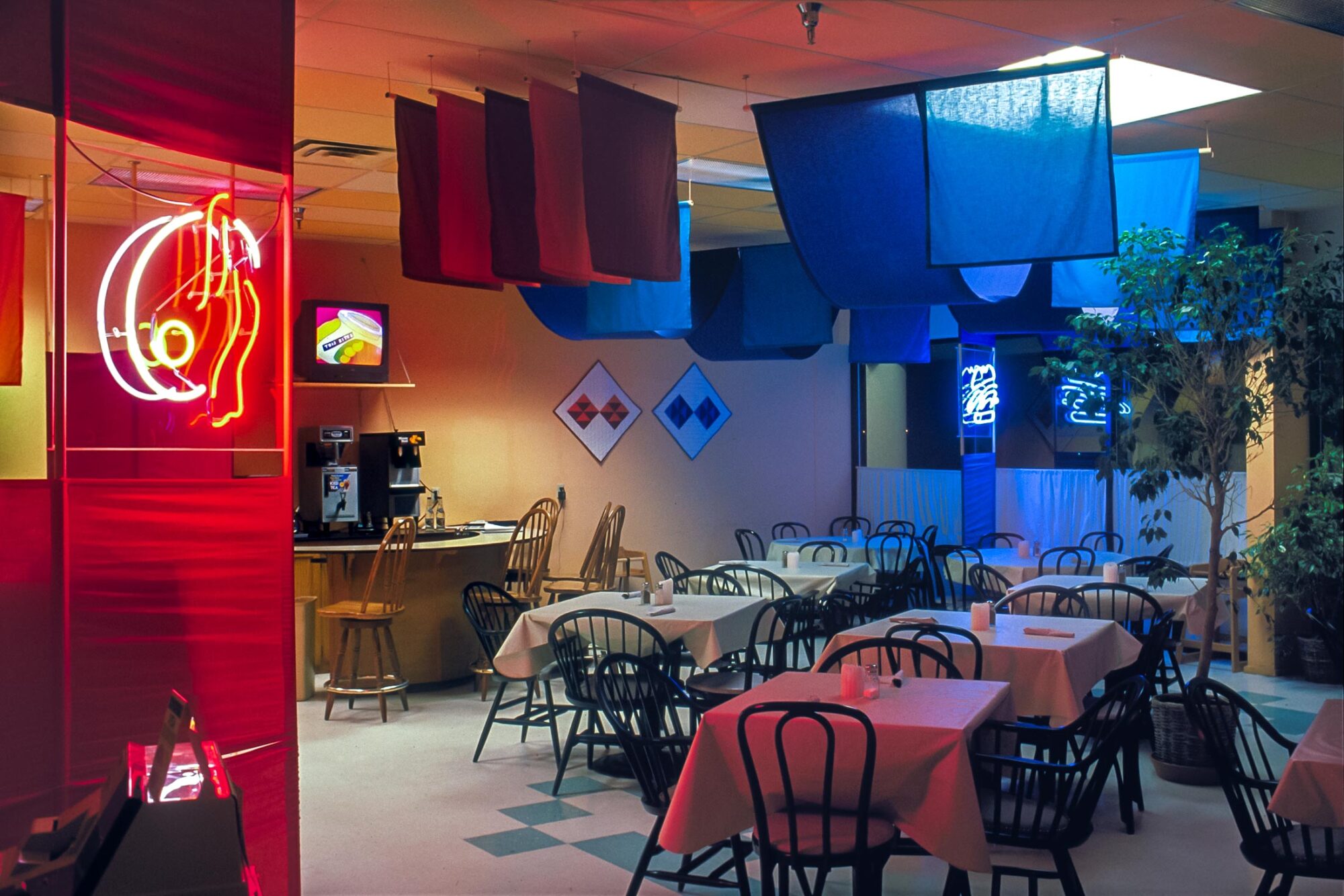 Amon's & More restaraunt interior design and neon sign graphics
