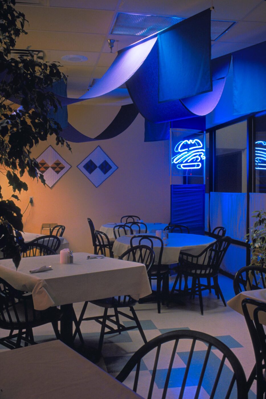 Amon's & More restaraunt interior design and neon sign graphics