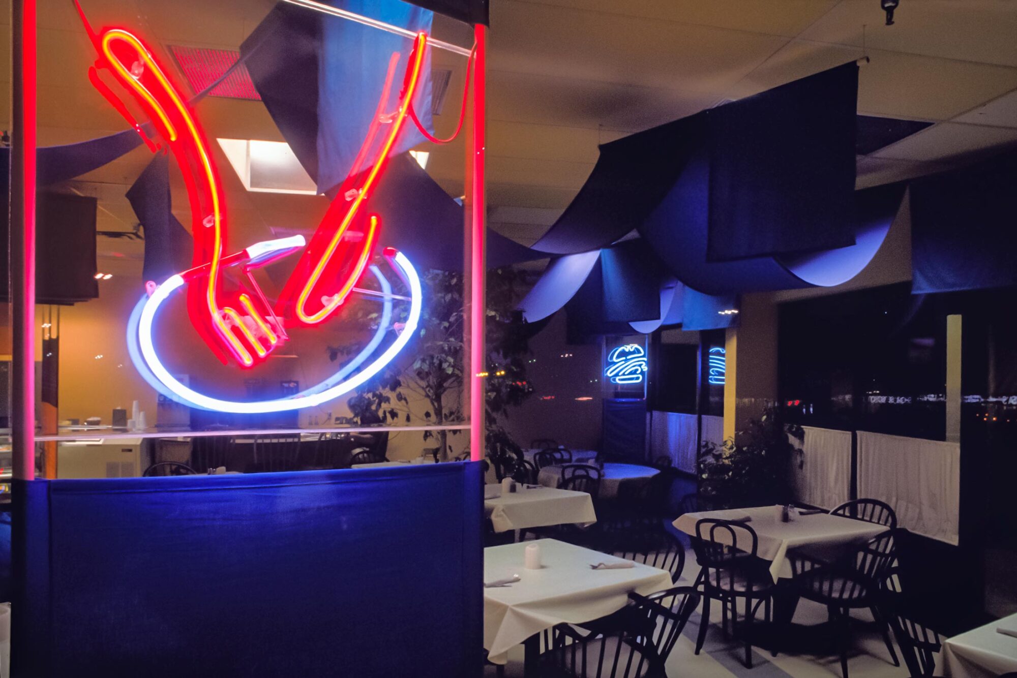 Amon's & More restaraunt interior design and neon sign graphics