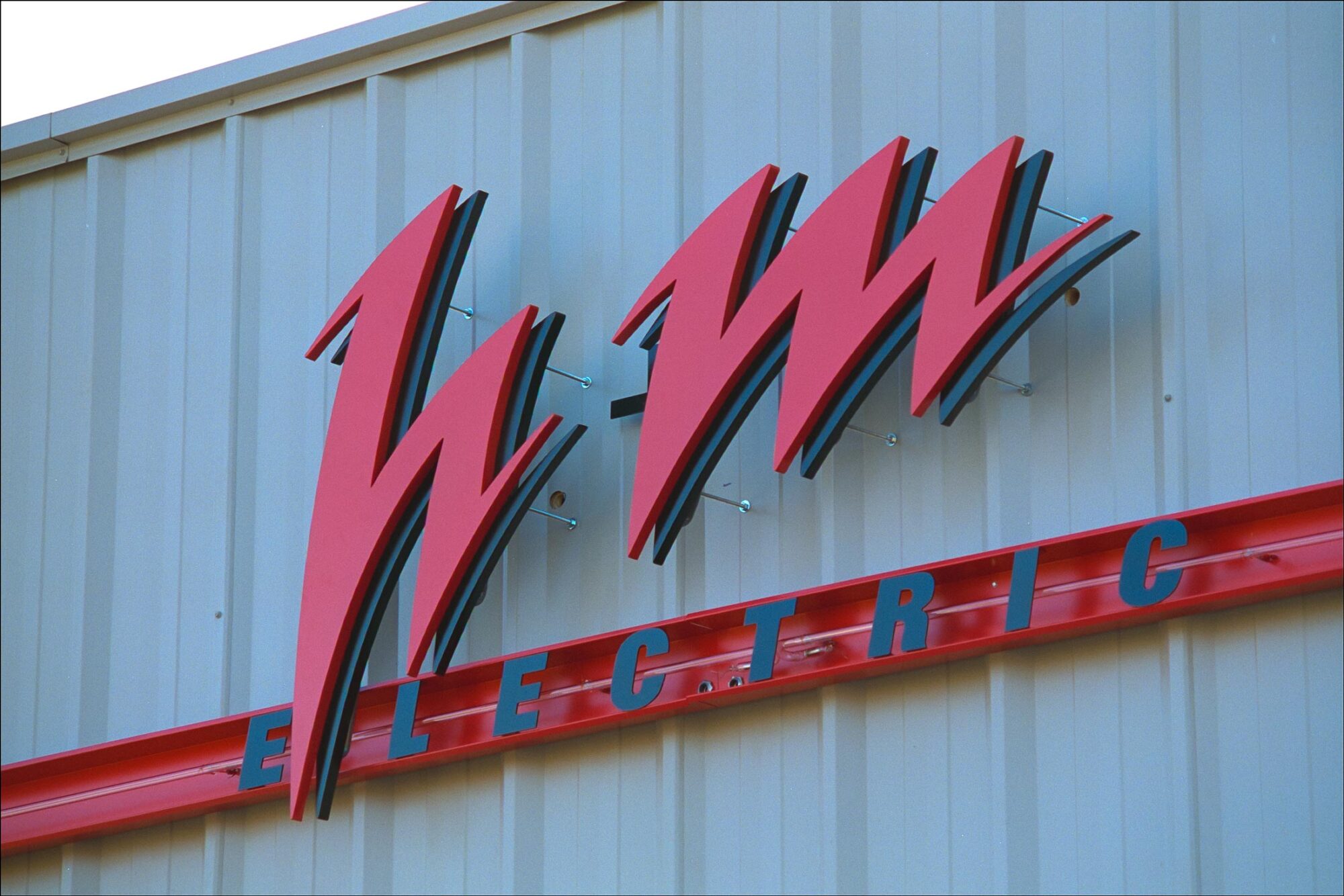H+M Electric building sign in daylight