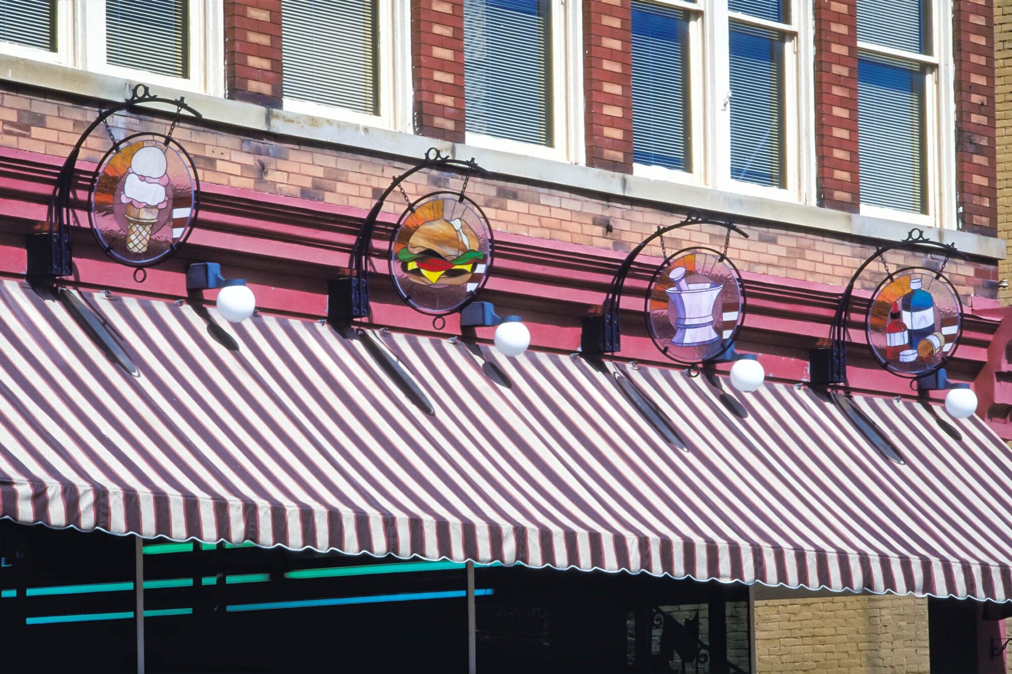 Somerset Pharmacy stained glass street signage