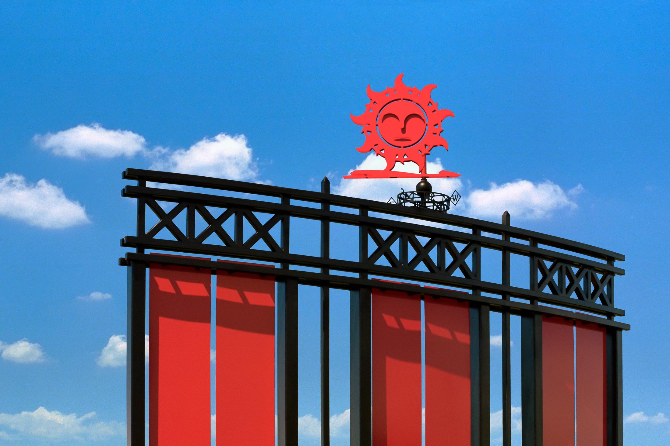 Sign top detail of metal work and weather vane