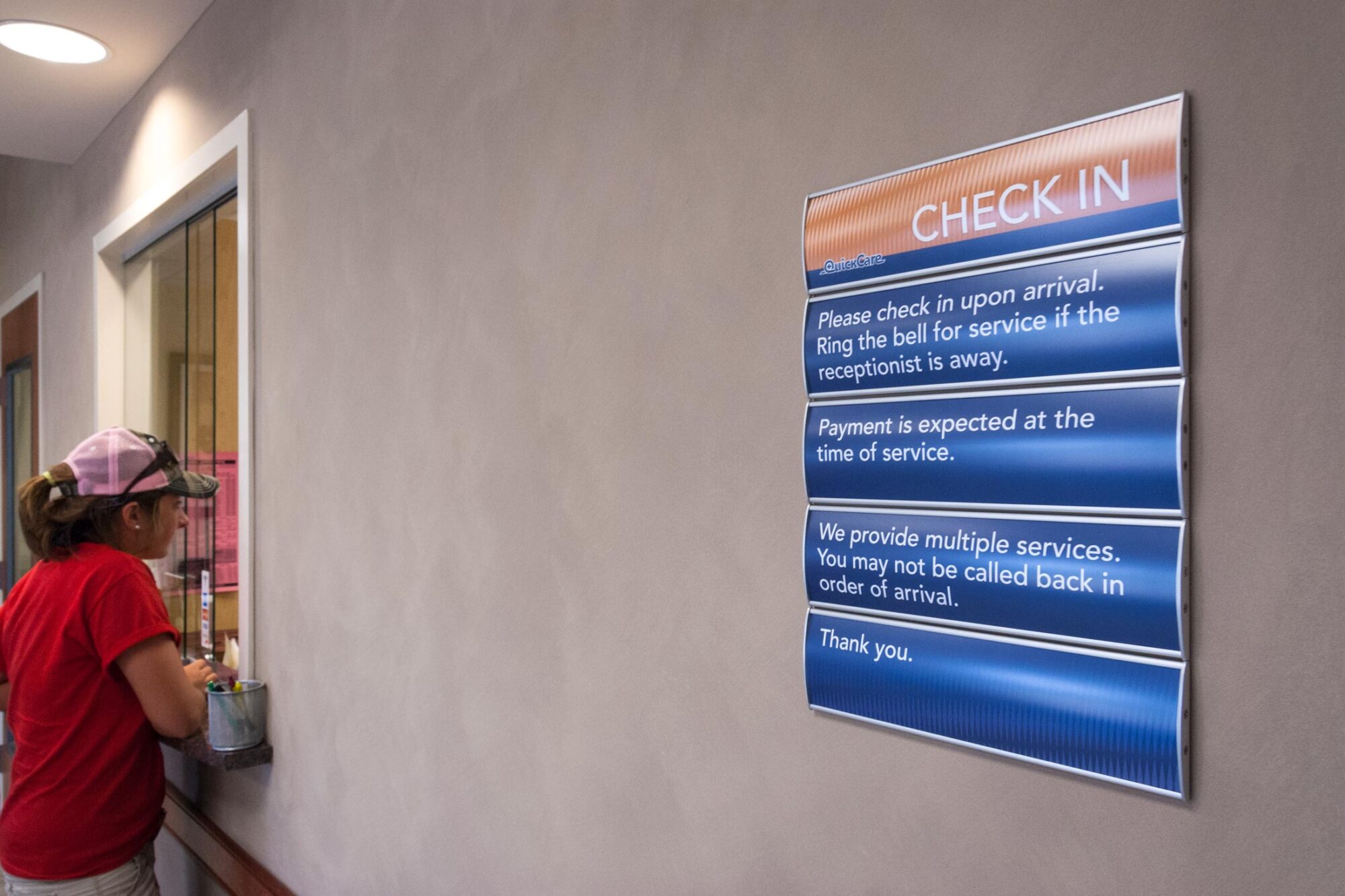 Quick Care check in sign
