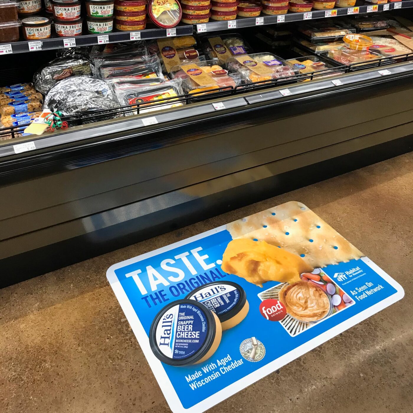 Hall's Beer Cheese grocery store floor sign