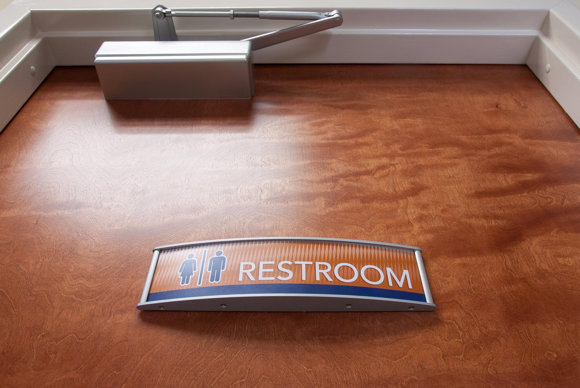 Quick Care restroom sign